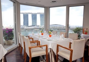The Fullerton Hotel - Romantic View of Lighthouse Restaurant & Rooftop Bar