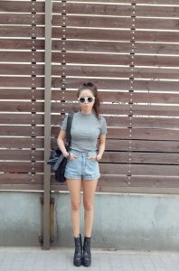 lady dressed in grey shirt and shorts
