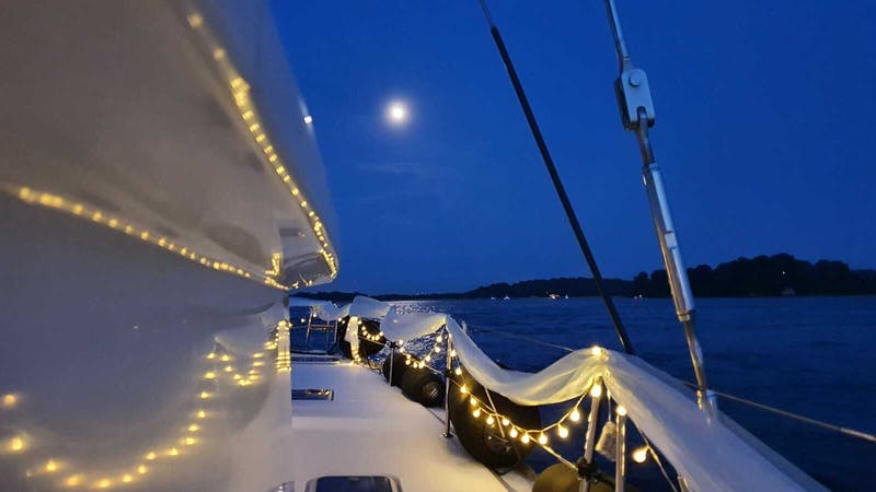 boat decked up with fairy lights for solemnisation 